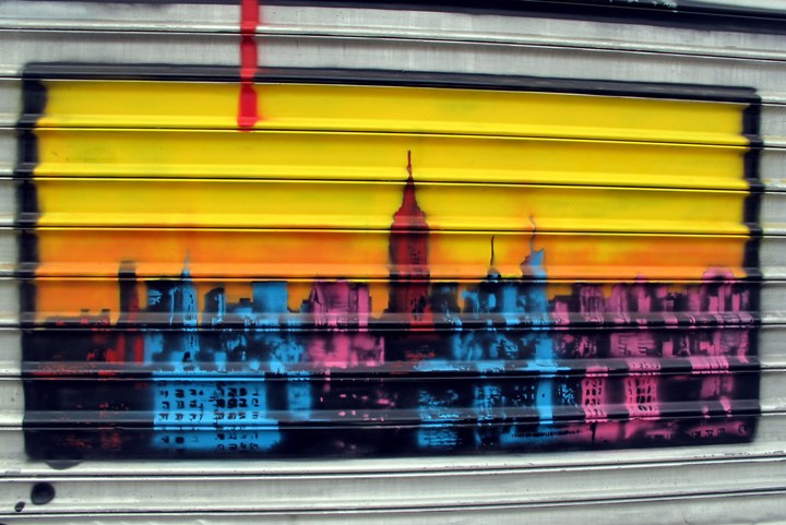 "Nick Walker stencil art on NYC shutter"