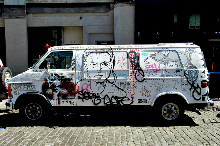 "Manhattan van with street art images"