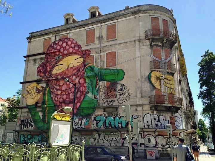 Os-Gemeos-and-Blu-street-art-Lisbon