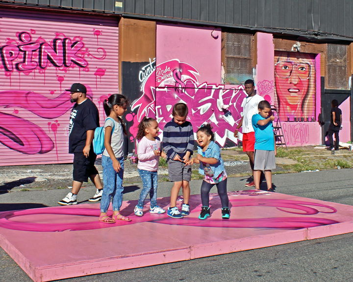 children-at-paint-for-pink-graffiti-newark-new-jersey